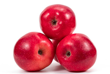 Red apples over white background