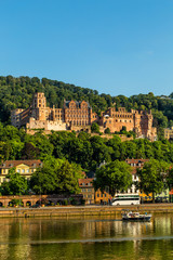 Fototapeta na wymiar View of city Heidelberg and ruins of renaissance Heidelberg Castle on Konigstuhl hill, Germany