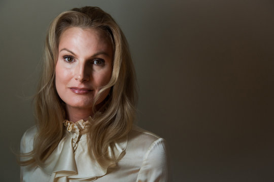 Portrait of a Revolutionary caucasian woman in a studio