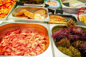 A variety of seafood on the counter