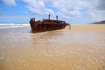 Fototapeta na wymiar Maheno shipwreck on 75 mile beach Fraser Island, Fraser Coast, Queensland, Australia
