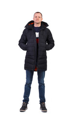 Front view of handsome man In long black jacket with a hood.