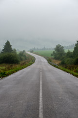 empty asphalt road outside city