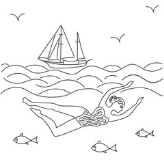 Woman swimming in the sea surrounded by fish.