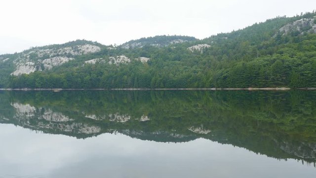View of La Cloche mountains and forested shoreline. Killarney Park in Ontario, Canada. Shot taken from canoe.