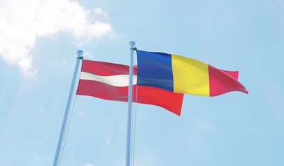 Romania and Latvia, two flags waving against blue sky. 3d image