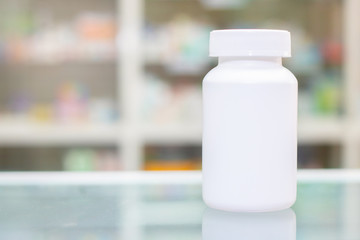 mock up white plastic bottle for contain pills  in drug store