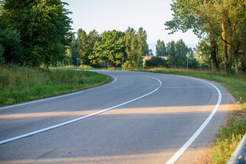 empty asphalt road outside city