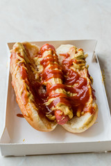 Box of Hot Dog with Ketchup and Mustard / Sausage Sandwich