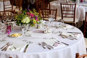 Wedding table decoration series - tables set for beautiful indoor catered luxury wedding event 