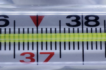 Medical thermometer in macro with temperature