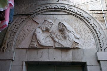 Via Dolorosa, 4th Stations of the Cross. The pilgrims who visit the Holy Land, pass the path that Jesus carried the cross to Calvary. Jerusalem 