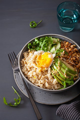 quinoa bowl with egg, avocado, cucumber, lentil. Healthy vegetarian lunch