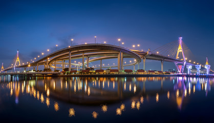 Obraz na płótnie Canvas The Bhumibol Bridge (also known as the Industrial Ring Road Bridge) at night, Bangkok, Thailand