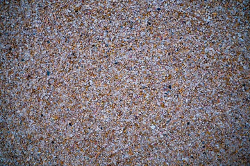 Wall covered with tiny colored rocks
