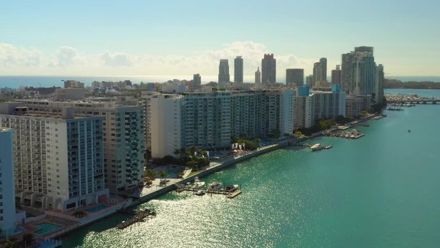 Aerial stock video Miami Beach condos on the bay 4k