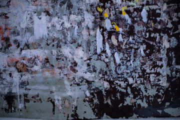 Colored spots and dirt on a wall after deleted ads