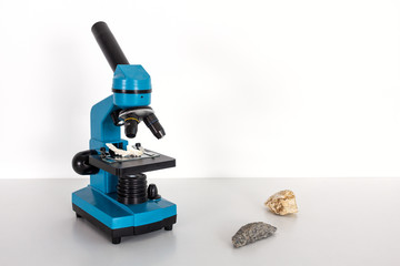 Laboratory Transmitted Light Compound microscope on white background. Science Equipment, medical research concept - Image.