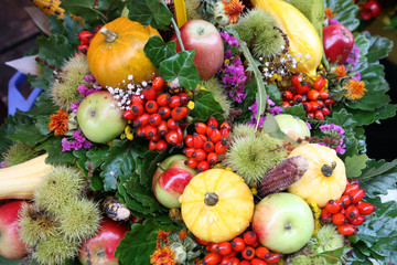 Fall arrangement with fruits and flowers