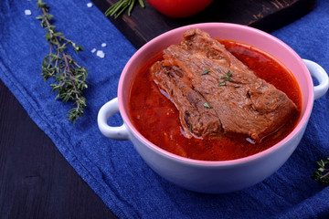 Borscht with beef. Traditional soup of Ukrainian and Russian cuisines
