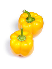 Two sweet yellow bell peppers