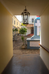 view from the corridor with a vintage chandelier on the courtyard of the Catholic Church
