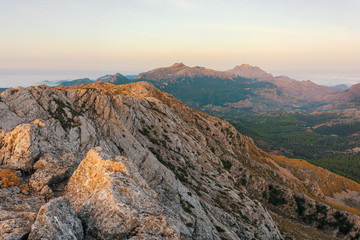 Mountains landscape viewed from a peak in Majorca. Puig Tomir mountain summit in Balearic Islands.