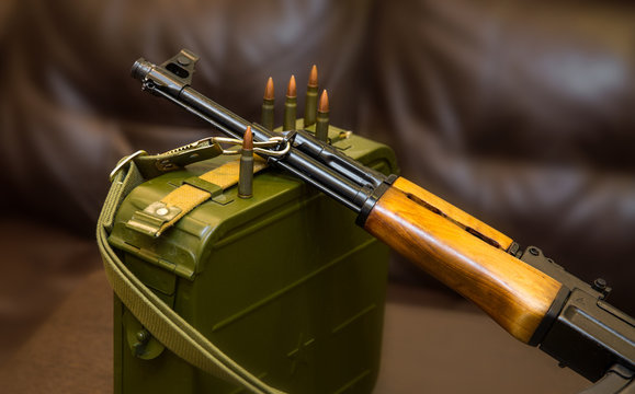 Russian assault rifle AK47 with a 7.62x39 cal. ammunition box 