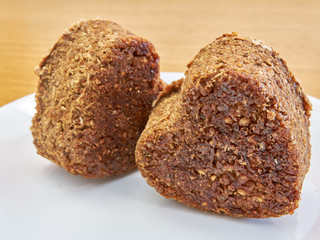 high-quality bread made at home from wheat germ and rye in the shape of a heart. healthy food. natural food