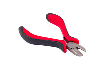 Nippers for cutting wire with red and black plastic or rubber handles isolated on white background without shadow