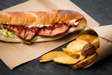 Sandwich in french bun with meat.