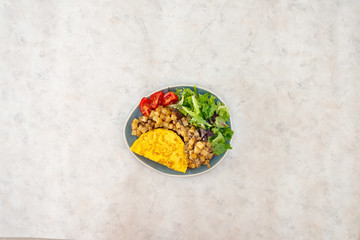 Obraz na płótnie Canvas French Omelette with Potatoes, Mushroom and Salad