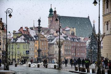 Warsaw old town winter scene under snowfall