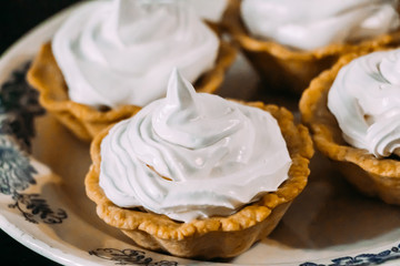 White egg cream cakes in tartlets