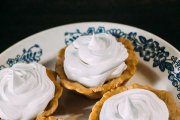 White egg cream cakes in tartlets