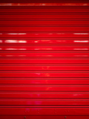 Background and texture of red color corrugated metal sheet,Slide door ,Roller shutter texture with...