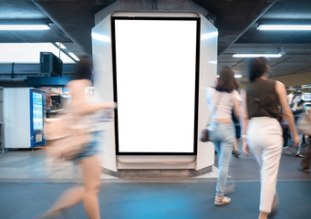 Mock up blank billboard white LED screen vertical for advertising on sky walk in Bangkok. Public building People walking.