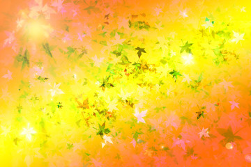 Autumn leafs and sun flare collage as abstract defocused wallpaper.