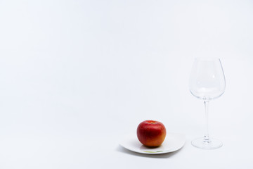 Alcoholic drinks such as wine or beer and variable colorful side dish such as vegetables or fruites surrounded clean white wall for the celebration of anniversary day.