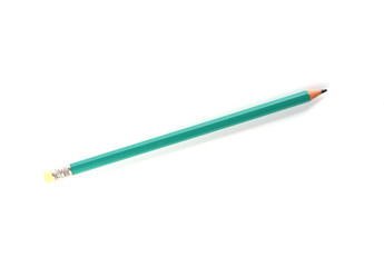 Green pencil on a white background. Stationery concept