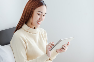 Attractive business woman use computer tablet to see her online store