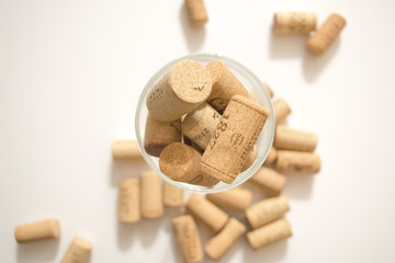 The wine glass filled by corks