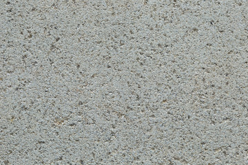 The surface texture of the brick is composed of fine sand, close-up, macro. Texture of Lightweight concrete block the bricks used in the construction.