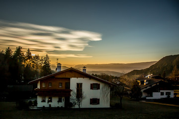Заголовок: Beautiful colorful sunset sky over the mountains in South Tyrol