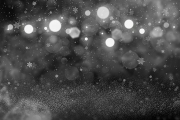 Fototapeta na wymiar beautiful sparkling glitter lights defocused bokeh abstract background with falling snow flakes fly, holiday mockup texture with blank space for your content