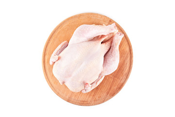 raw chicken carcass on wood desk © arybickii