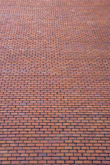 Red brick wall in perspective to the top