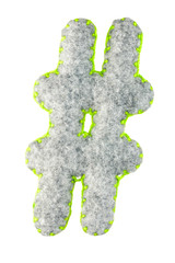 The octothorpe symbol (#) typographic sign from gray felt isolated on a white background. Part of...