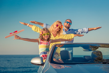 Happy family travel by car