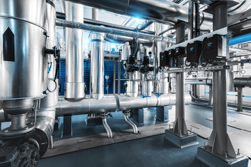 pipe line with steam supply pumps, pressure gauges and control readings installed in the boiler room